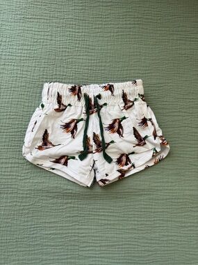 Kids White Duck-Print Swim Trunks with Green Drawstring